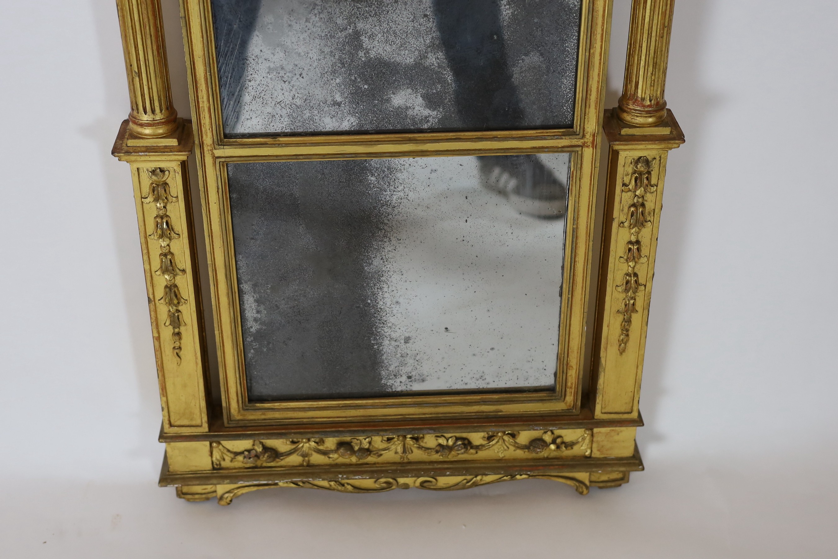 A George III giltwood pier glass